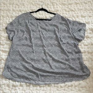 EUC tunic style black & white patterned blouse. Boat neck. Longer in the back.